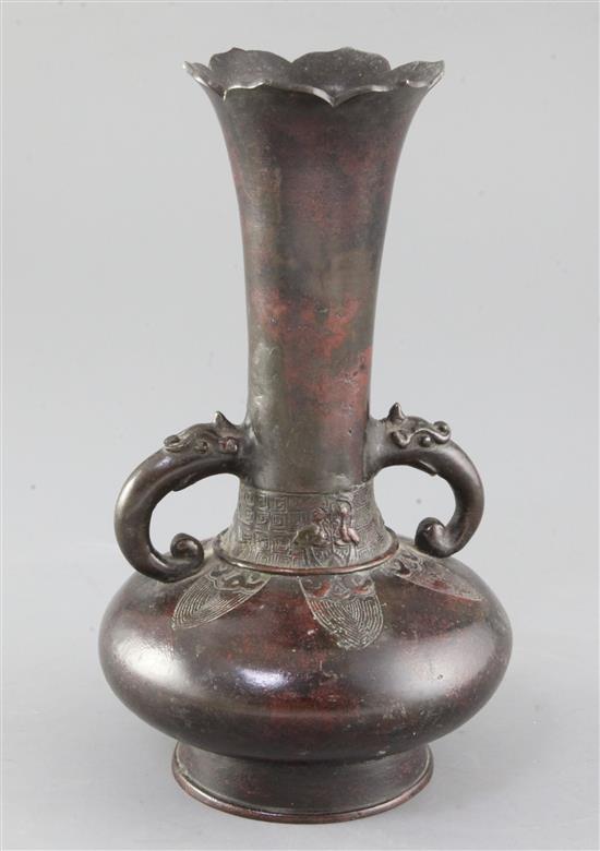 A Chinese bronze bottle vase, Song - Yuan dynasty, height 23cm, old repairs